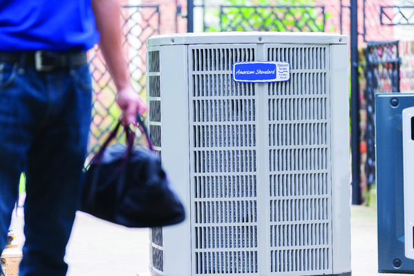 AC technician & AC unit.