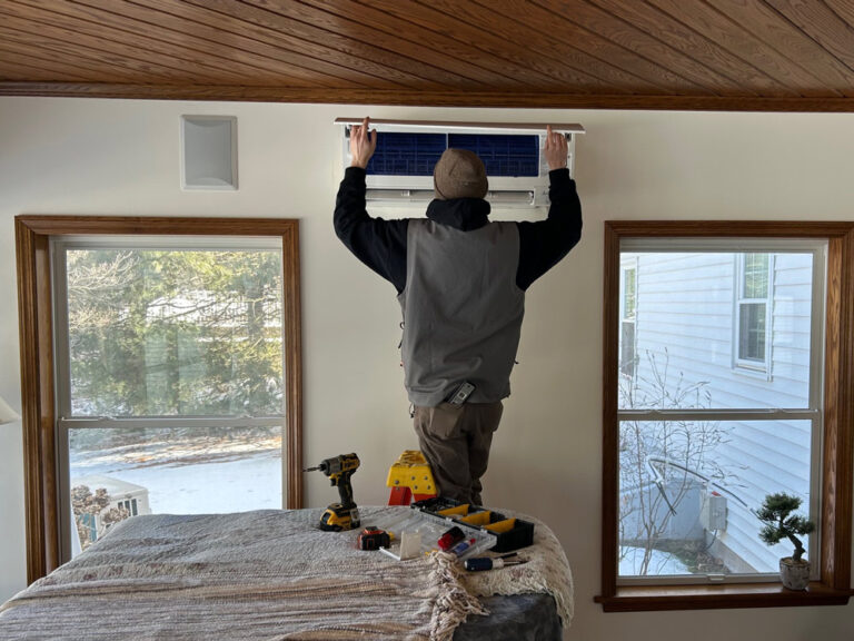 mini split tech doing an install - mgm mechanical hvac