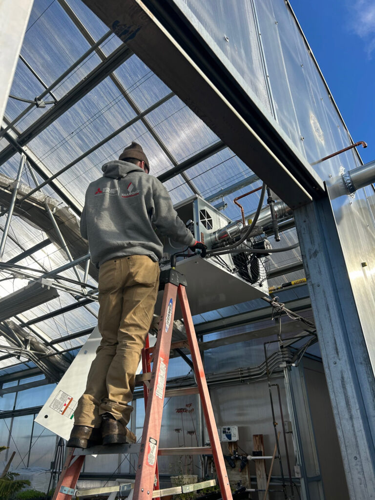 mgm mechanical hvac tech working on new commercial hvac system installation